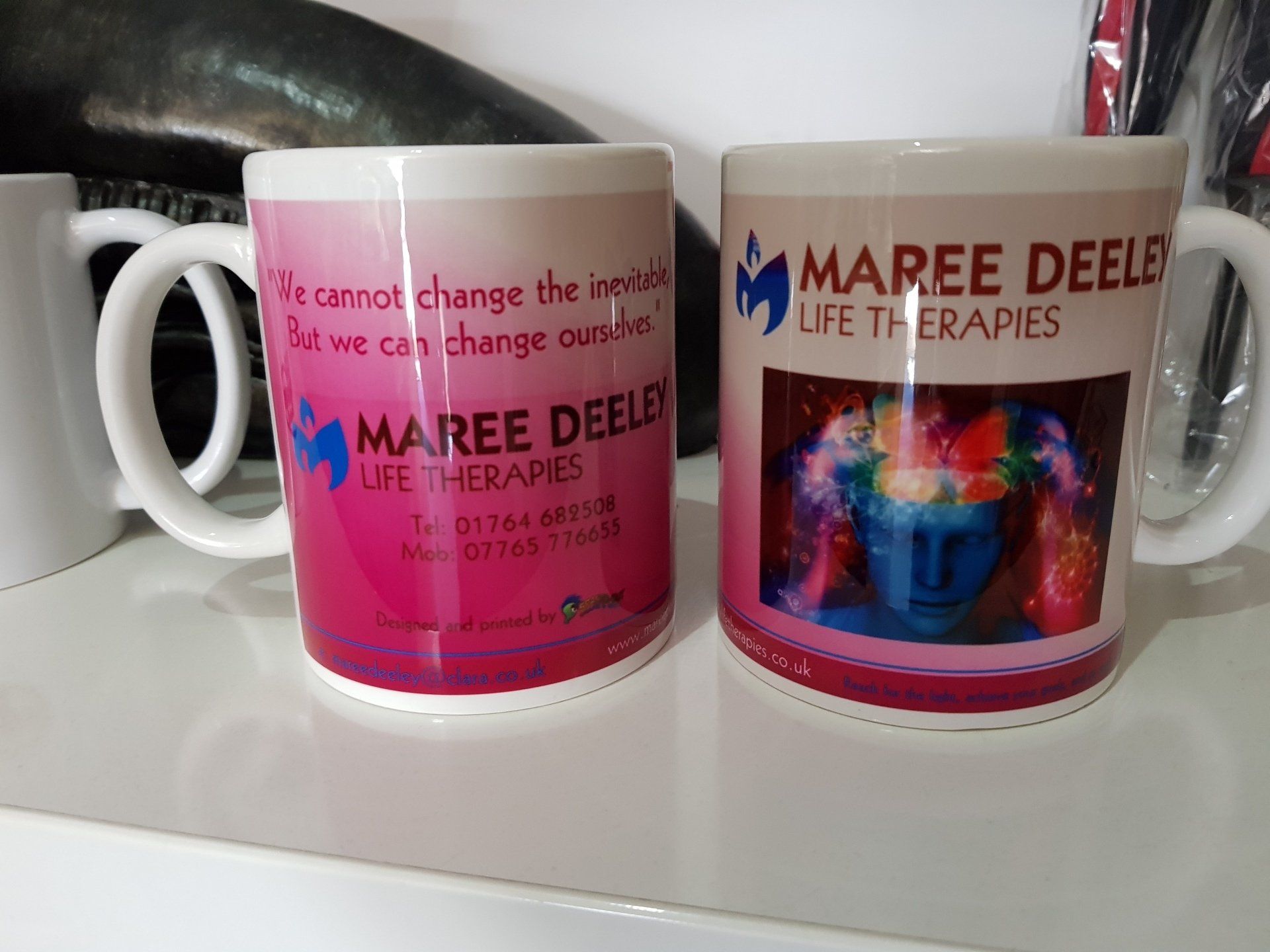 Text and images printed on two mugs
