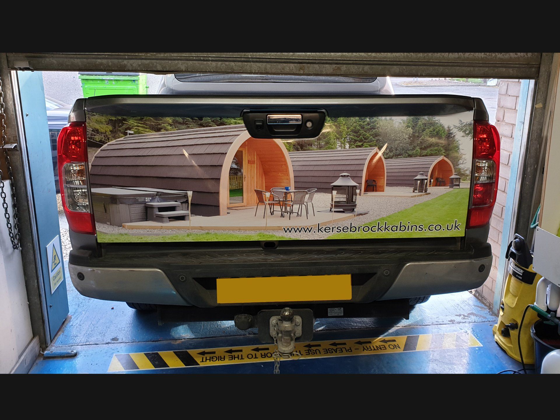 Car signs on a pick-up truck, rear view