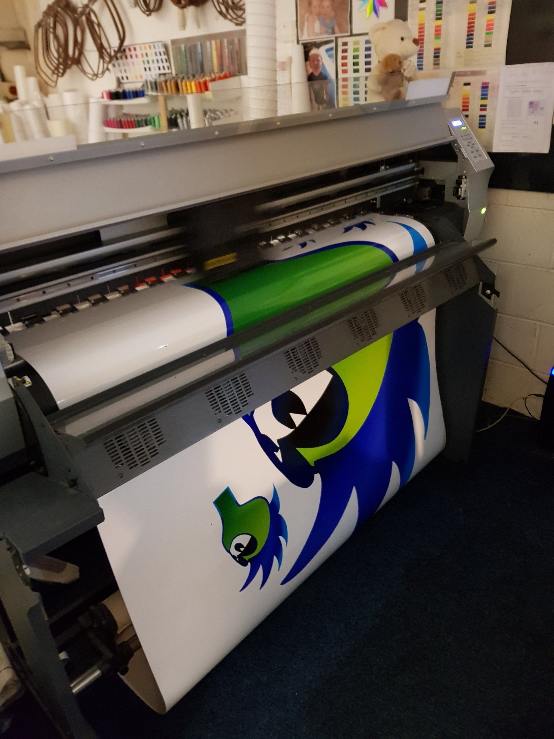 Large format digital printer for banners and signs