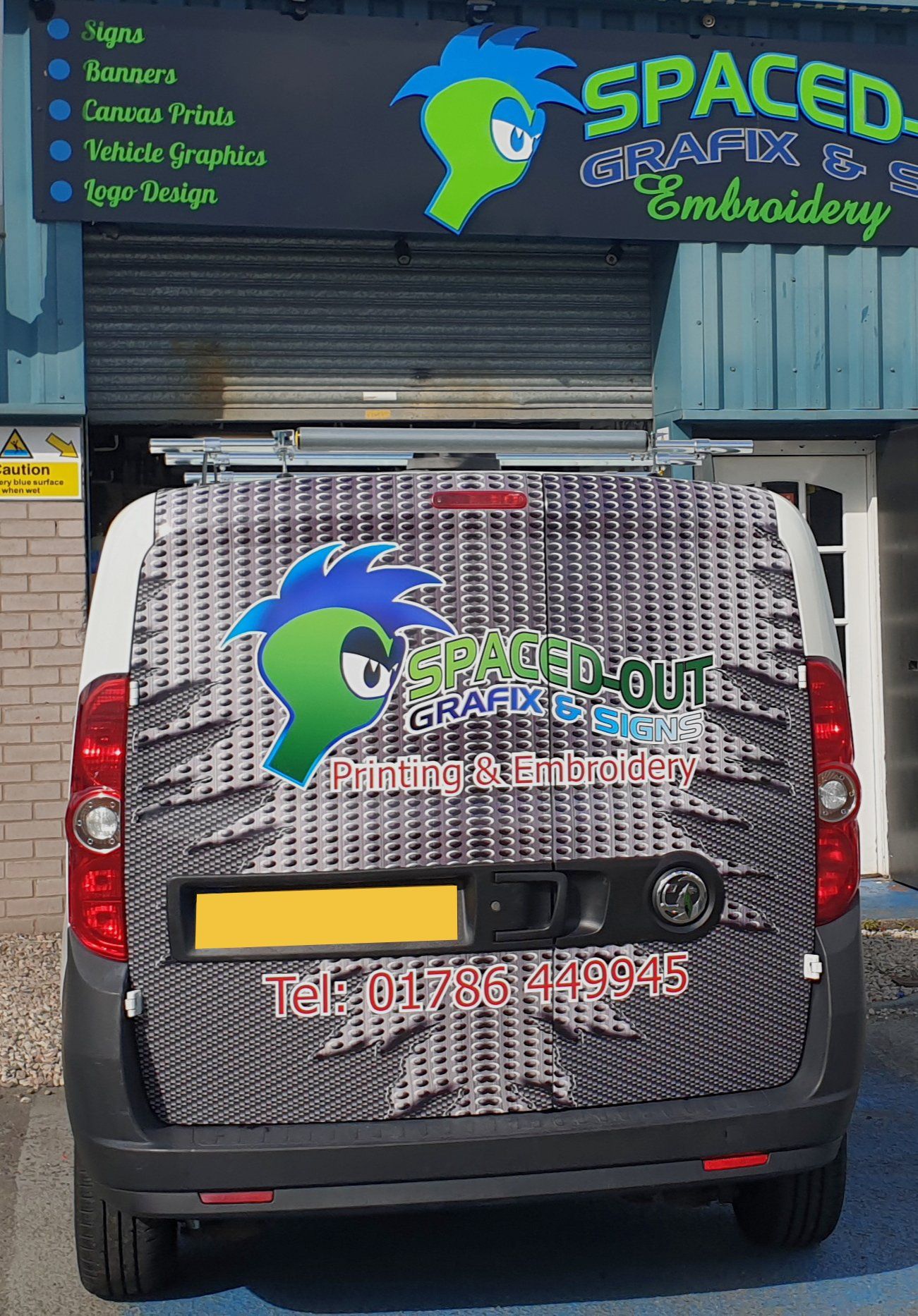 Business car Spaced-Out Grafix ﻿﻿& Design