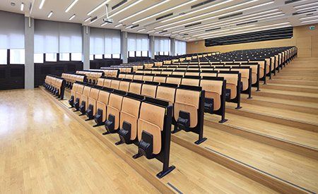 Cleaning university lecture theatre