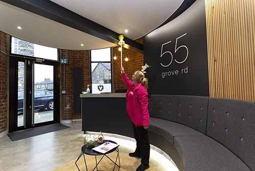 High level dusting in office reception