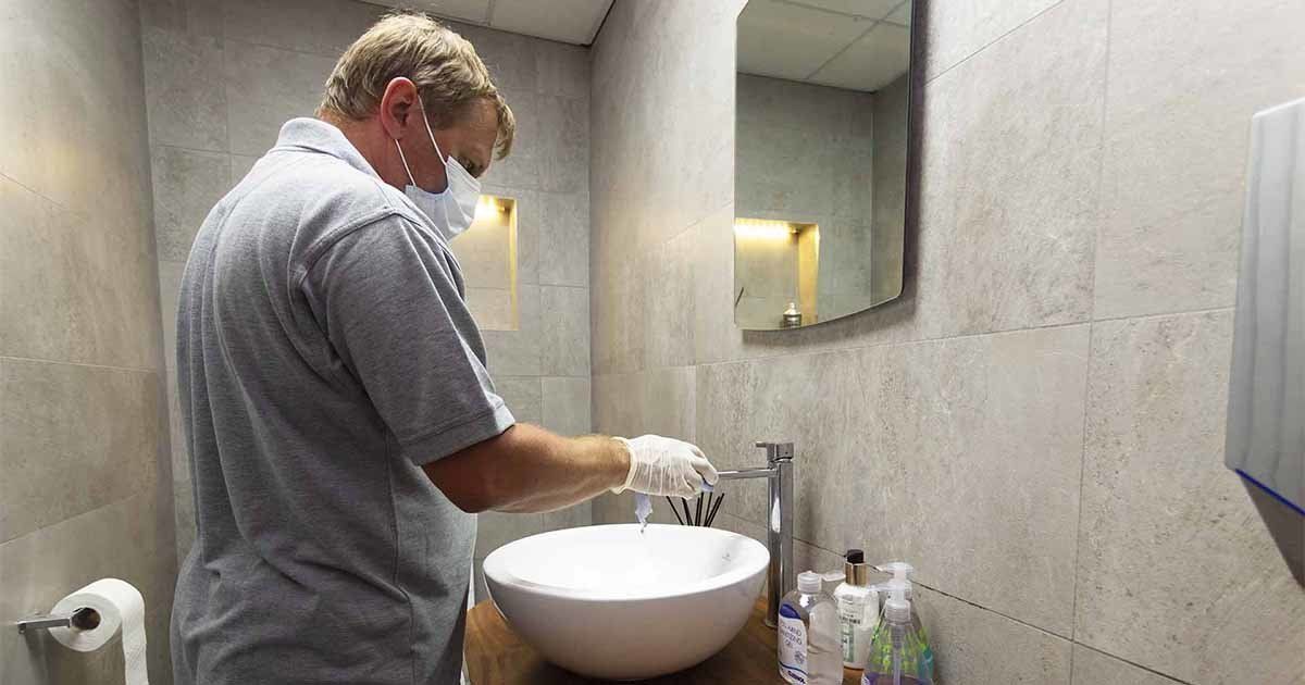 Touch point cleaning in office washroom at car showroom in Knaresborough