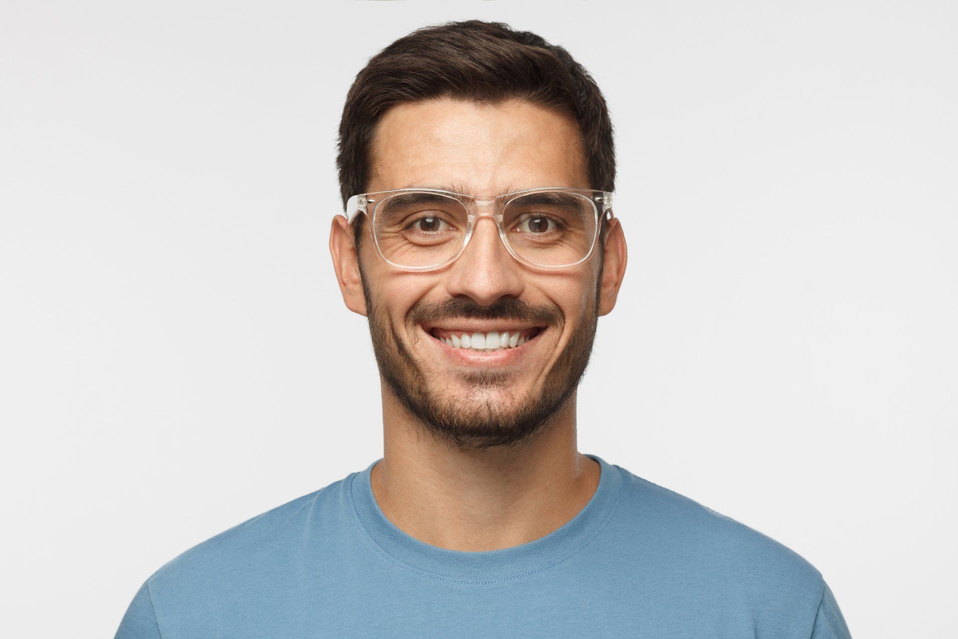 Man Wearing Eyeglass — Eastpointe, MI — Eastland & Professional Dental Center Man Wearing Eyeglass — Eastpointe, MI — Eastland & Professional Dental Center