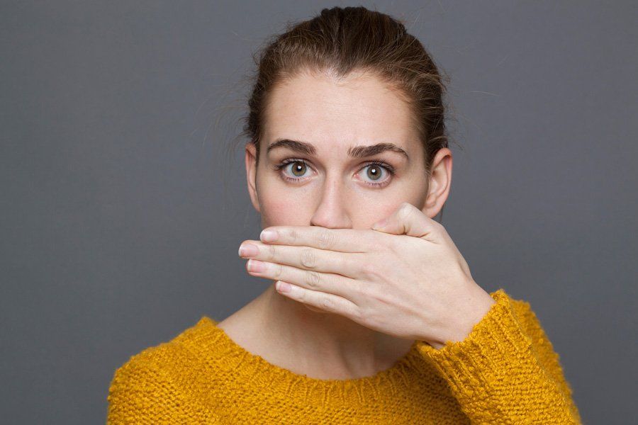 Woman Having Bad Breath — Eastpointe, MI — Eastland & Professional Dental Center Woman Having Bad Breath — Eastpointe, MI — Eastland & Professional Dental Center