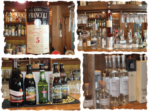 scaffali con birre, vini e superalcolici