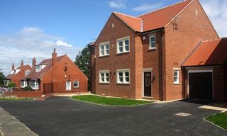 Asphalt and macadam road laying