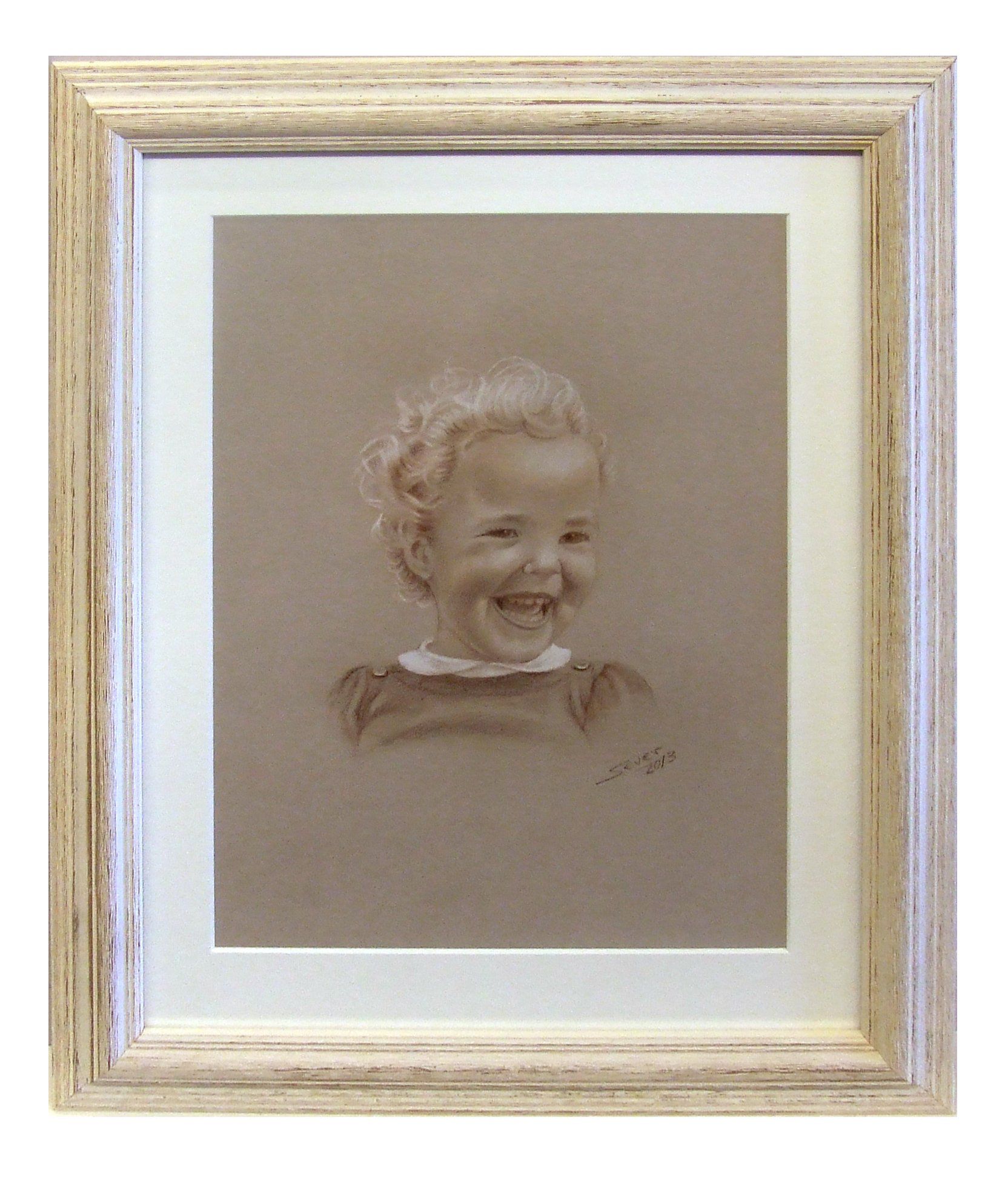 A canvas of a baby picture