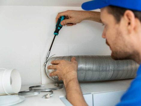 Duct cleaning expert cleaning a dirty duct