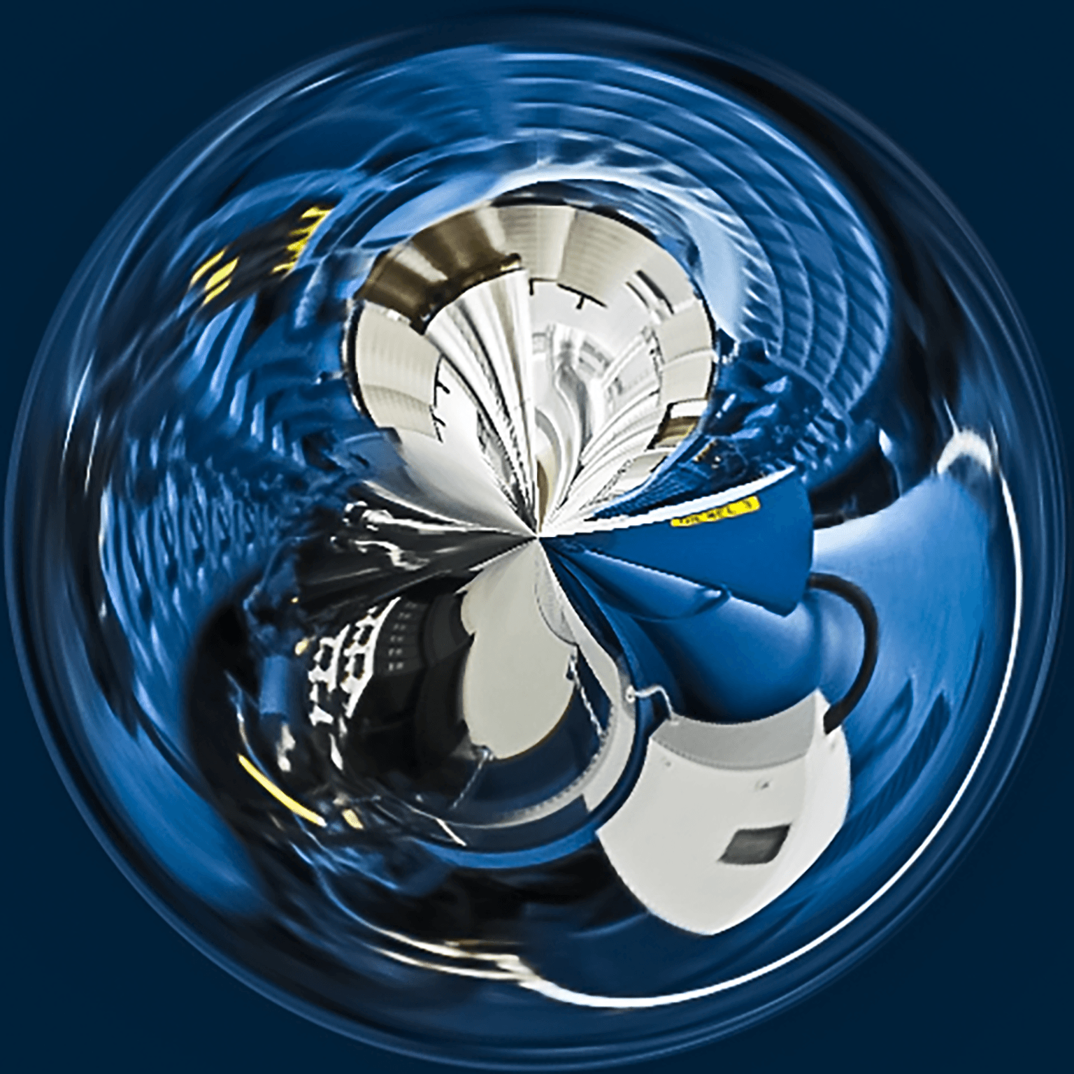 A blue sphere with a white object in it