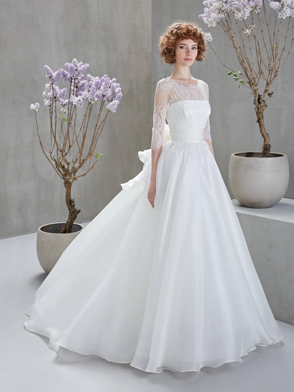 Abito da sposa scollo maniche lunghe