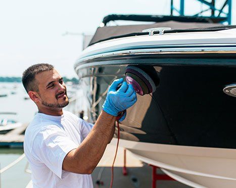Boat — Man Repairing the Boat in Churchville, MD Boat — Man Repairing the Boat in Churchville, MD