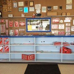 Fire Extinguisher Sign - Our Story in Greeley, CO