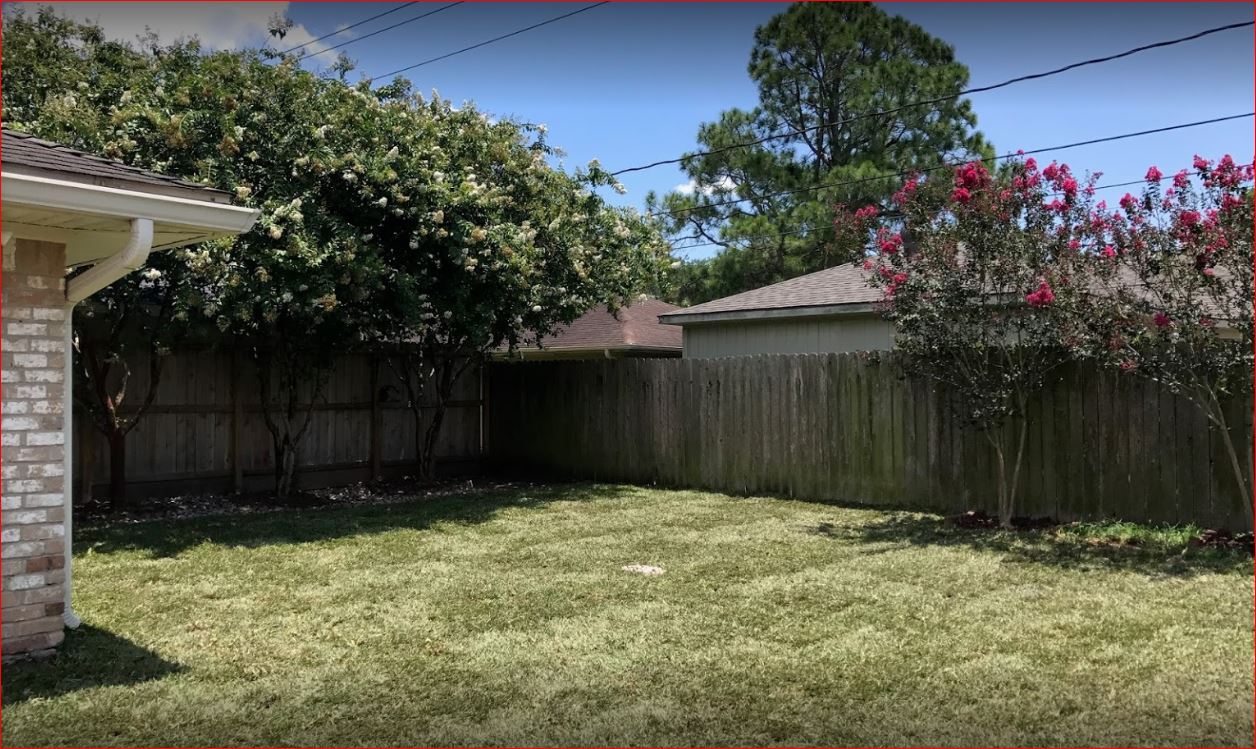 Commercial Services — Backyard with Bermuda Grass in Houston, TX