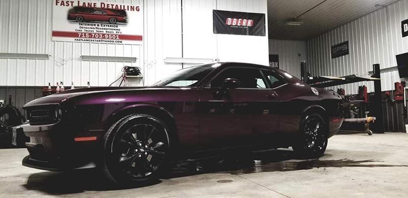 Purple Dodge Challenger in Detailing Bay