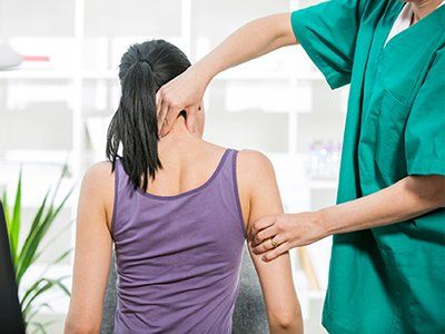 Family Chiropractor — Woman And A Chiropractor in Arcadia, CA Family Chiropractor — Woman And A Chiropractor in Arcadia, CA