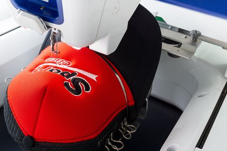 Embroidering a baseball cap