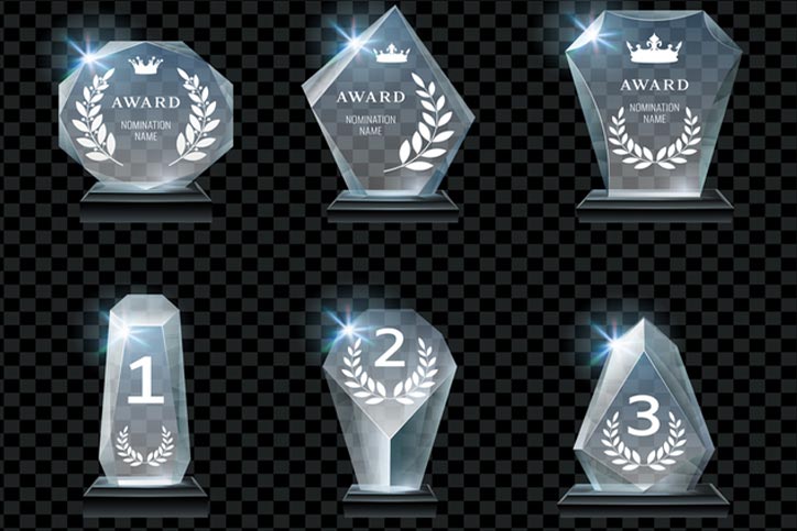 Winner glass trophy. First place award, crystal prize and signed acrylic trophies