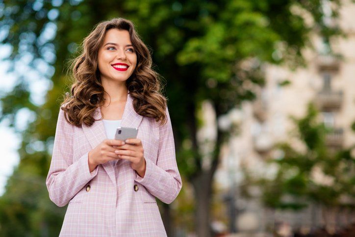Young woman in pink jacket