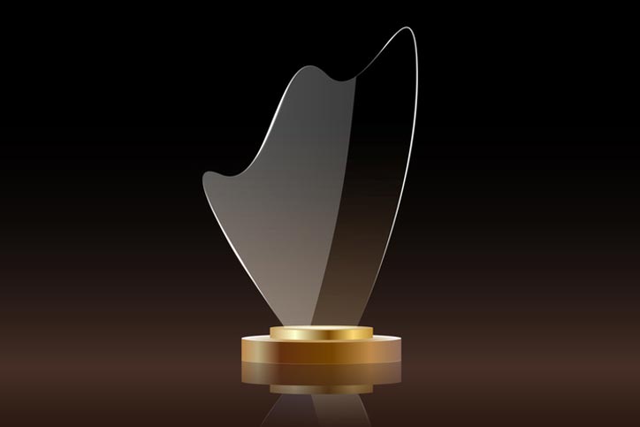 Glass shining golden trophy.