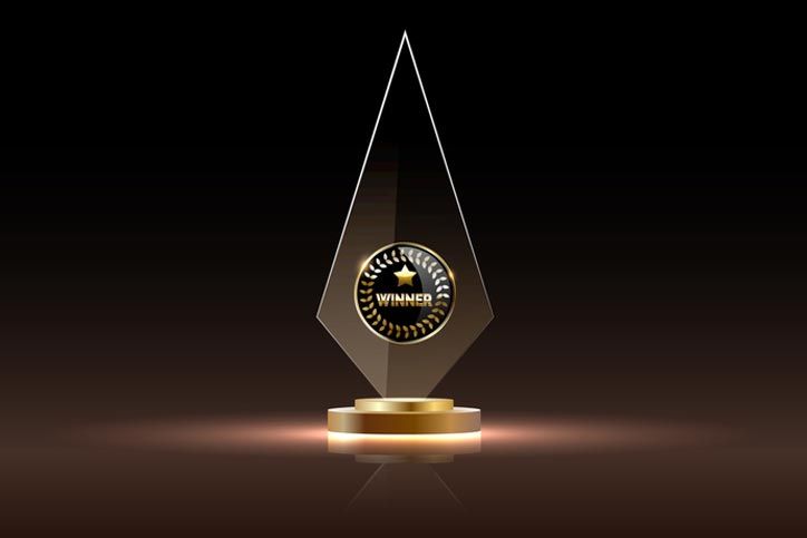 Glass shining golden trophy for winner