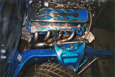 Header Services — Blue Car Custom Header Installed in Bakersfield, CA