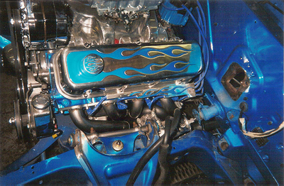 Vehicle Header Services — Blue Car Custom Header Installed Close Up in Bakersfield, CA