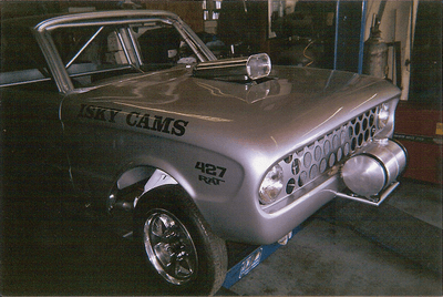 Mufflers — Front Side View of Grey Vintage Car in Bakersfield, CA