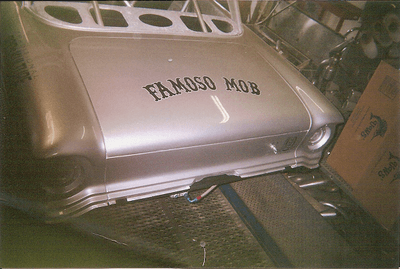 Custom Muffs— Rear Bumper of Grey Vintage Car in Bakersfield, CA