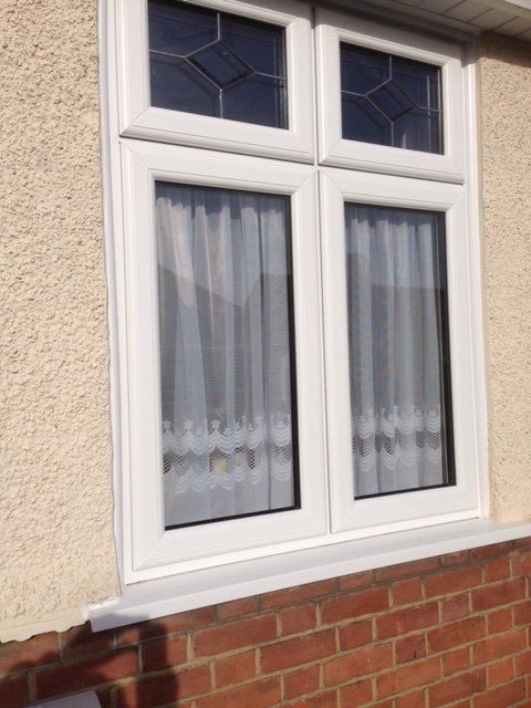 white frame window