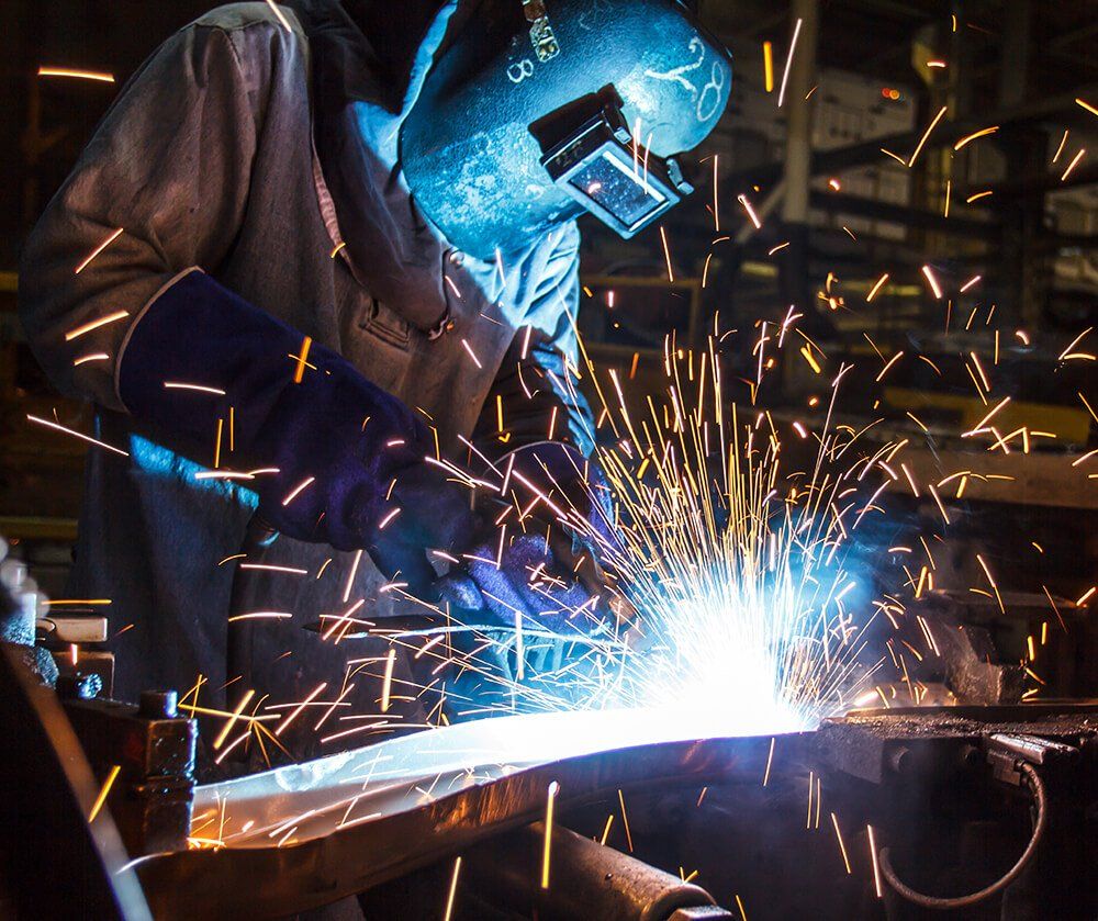 Man wielding with safety mask on