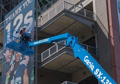 men during billboard maintenance