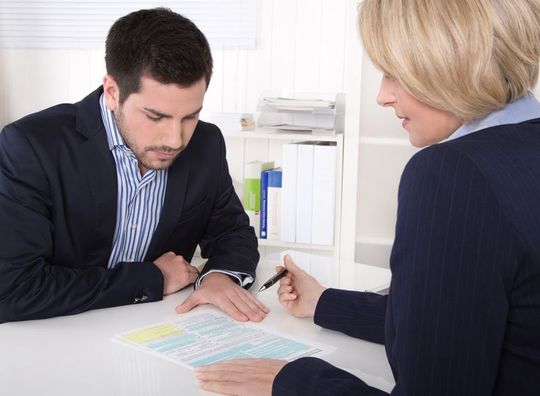 Consultation at office between consultant and customer