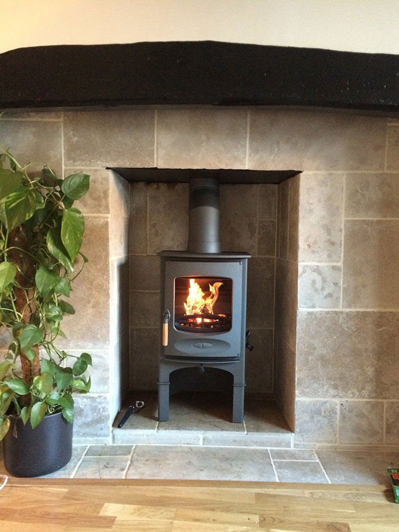 stove in a tiled alcove