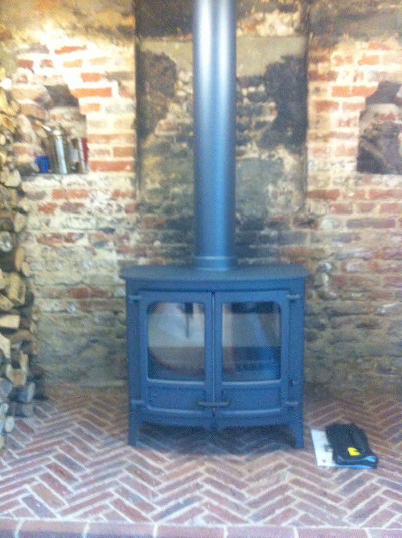 Outdoor stove with a tall chimney