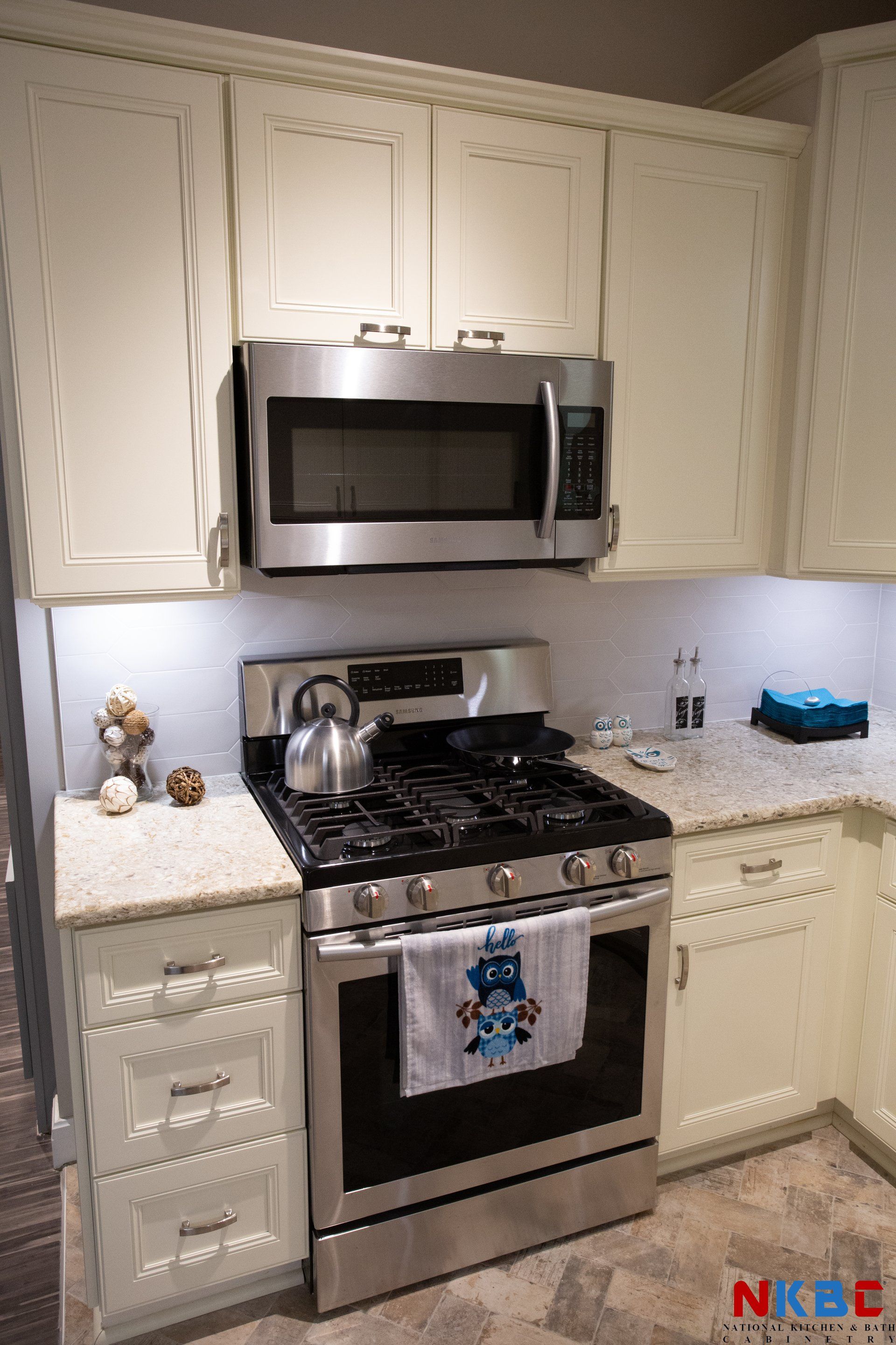 Kitchen Cabinetry with Microwave and Stove