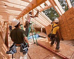 Carpenters working at a construction site - Commercial Insurance in Artesia, NM Carpenters working at a construction site - Commercial Insurance in Artesia, NM