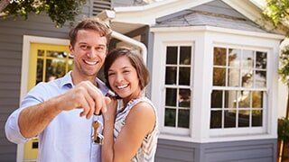 Couple with Keys - Homeowners Insurance in Artesia, NM Couple with Keys - Homeowners Insurance in Artesia, NM