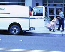 Loading Parcels into Van - Insurance Agency in Artesia, NM Loading Parcels into Van - Insurance Agency in Artesia, NM