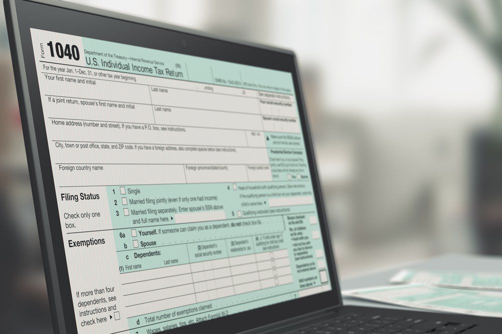 Closeup of A Computer Laptop with A Tax Form on Screen — Newport, TN — K & S Bookkeeping & Tax Services Closeup of A Computer Laptop with A Tax Form on Screen — Newport, TN — K & S Bookkeeping & Tax Services