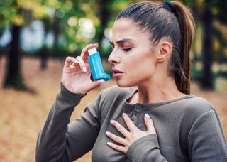 Young Woman Treating Asthma With Inhaler — Hickory, NC — Hickory Allergy and Asthma Clinic PA Young Woman Treating Asthma With Inhaler — Hickory, NC — Hickory Allergy and Asthma Clinic PA