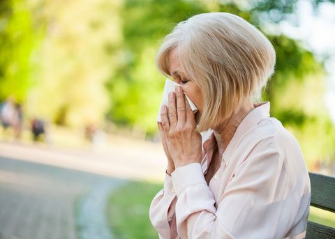 Woman Sneezing — Hickory, NC — Hickory Allergy and Asthma Clinic PA Woman Sneezing — Hickory, NC — Hickory Allergy and Asthma Clinic PA
