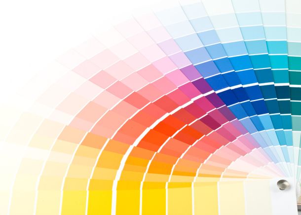 Color swatch fan displaying various shades of yellow, orange, red, purple, blue, and green.