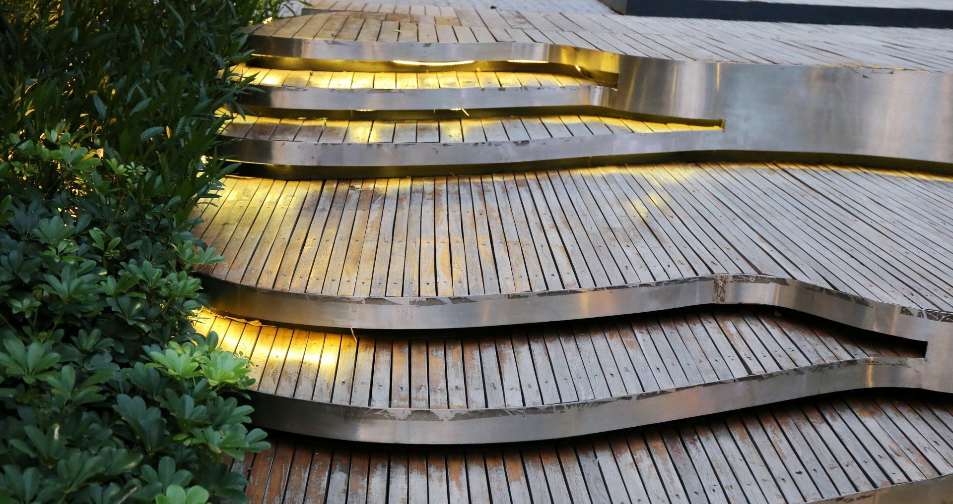 A set of stairs made of wood and metal