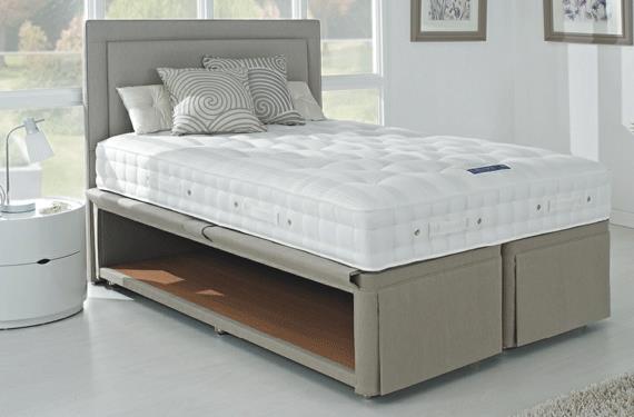 a double bed wooden furniture with dressing table and wardrobes