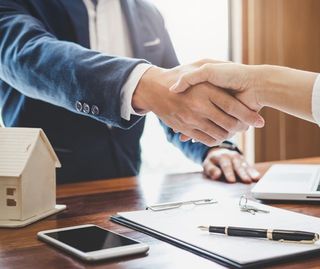 Shaking Hands With Attorney — Las Vegas, NV — Law Office of Richard L. Tobler, LTD. Shaking Hands With Attorney — Las Vegas, NV — Law Office of Richard L. Tobler, LTD.