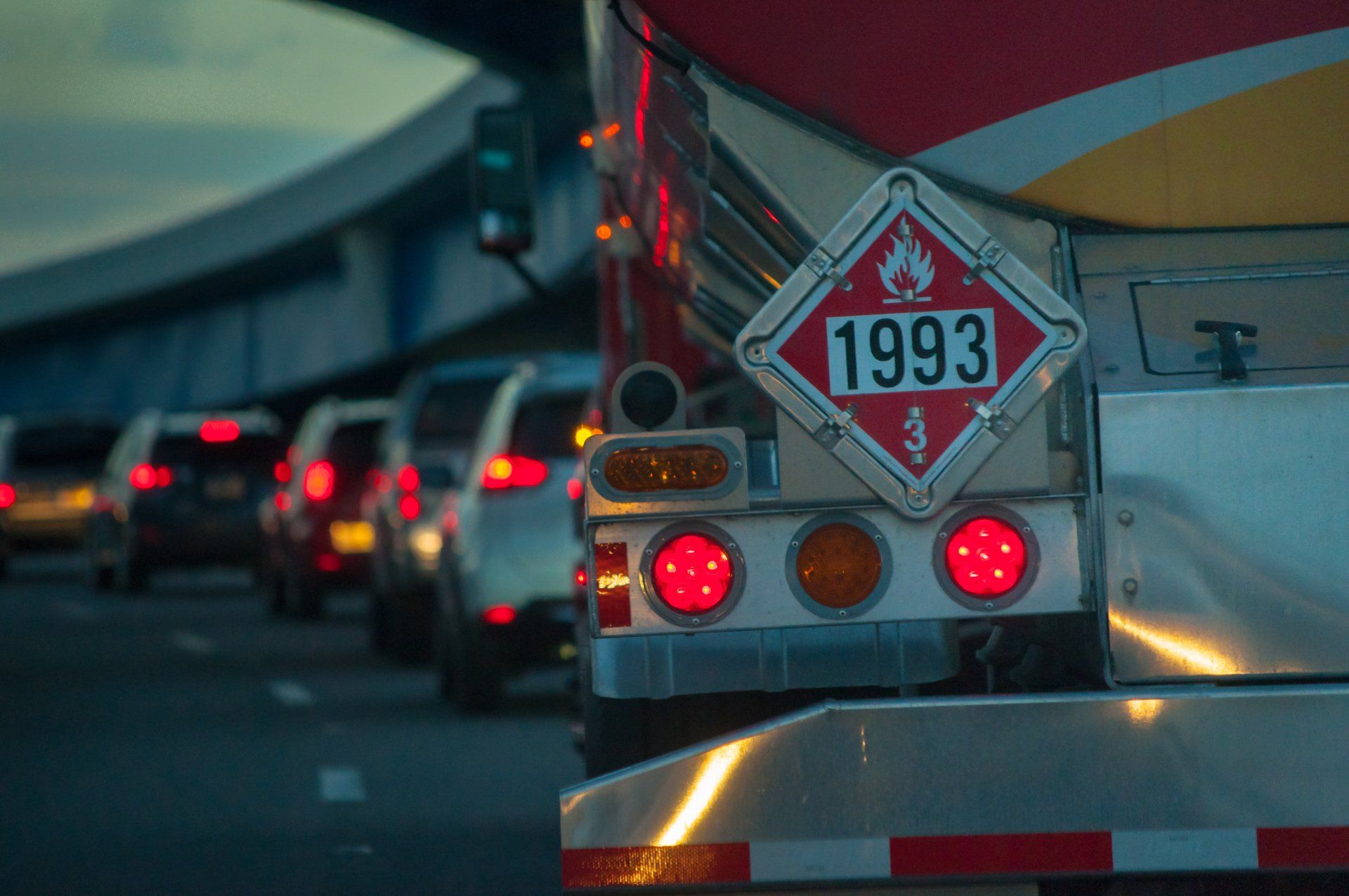 riear-view close-up of semi-truck in traffic