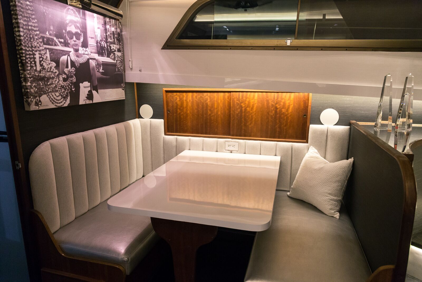 A room with a table and a couch in it
