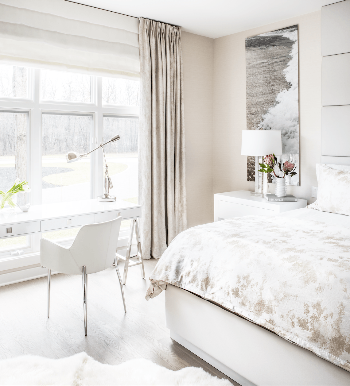 A bedroom with a bed , desk , chair and window.
