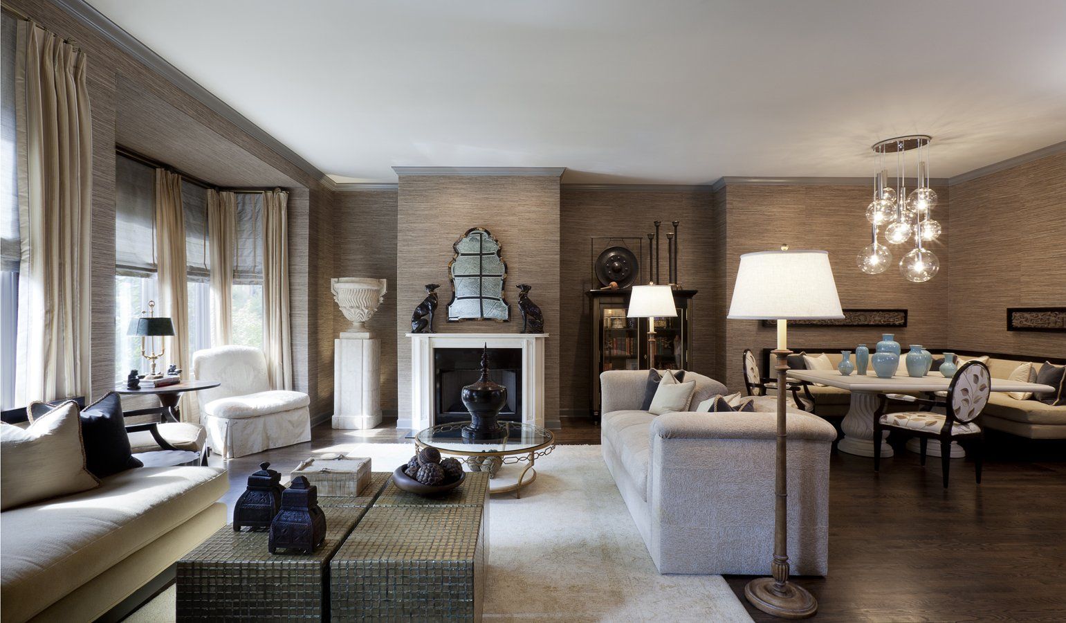 A living room filled with furniture and a fireplace